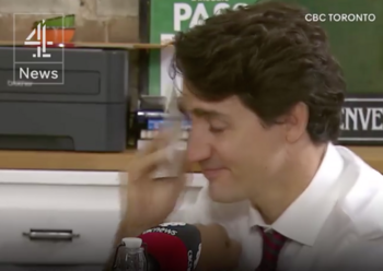 Justin-Trudean-cries-as-he-meets-a-family-of-Syrian-refugees-Dec-8-2016.png